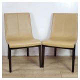 Pair of Holly Hunt siren leather side chairs