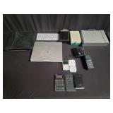 Group of electronics, calculators, Apple