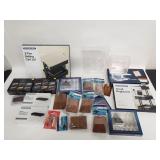 Box of miscellaneous display cases, and model
