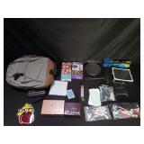 Box of miscellaneous, selfie stick, mirror, name