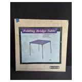 Folding bridge table