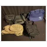 Group of backpacks and camera bags
