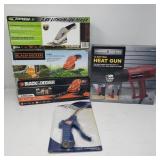 Group of power tools, lawn shears, heat gun