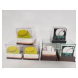 Group of glass and plastic sports cases