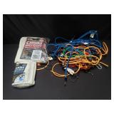Canvas drop cloths and group of bungee cords
