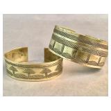 Pair of 50-year-old hand-engraved brass