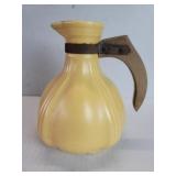 Padre pottery pitcher with wood handle