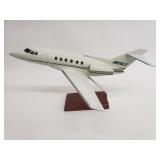 N800LX composite model airplane on wood stand