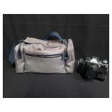 Canon AE-1 program camera with accessories