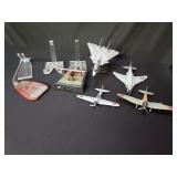 Collection of model combat airplanes and stands