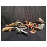Collection of model airplanes, cannons, etc