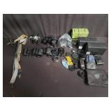 Collection of camera lenses and binoculars