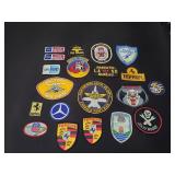 Vintage patches including Ford, Ferrari,