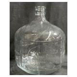 Vintage mountain valley spring water glass jug