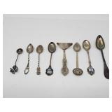 7 silver souvenir spoons, 2 marked sterling