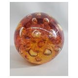 Amber glass sphere paper weight