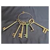 Six brass skeleton keys decoration
