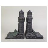 Pair of cast iron light house bookends