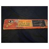 Vintage mighty mouse slide rule and black board