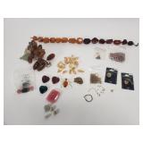 Collection of costume jewelry with some amber