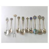 Sterling silver souvenir spoons and 1 olive fork
