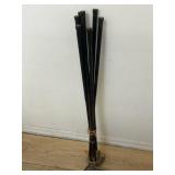 Group of eight antique golf clubs