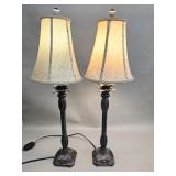 Pair of contemporary metal and composite table