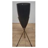 Vintage fiberglass bullet planter with metal stand