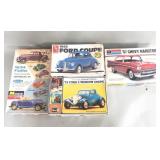 Collection of vintage plastic model cars by