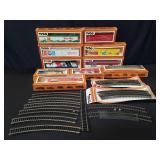 Collection of Tyco trains and tracks