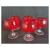 Five ruby glass pedestal base dessert glasses