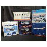 Group of die-cast model planes and "Star Trek"