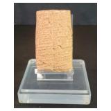 Terracotta Mesopotamian cuneiform tablet on a