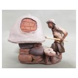 Signed clay sculpture