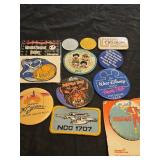 Lot of 11 assorted pins, patches, coins