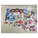 Collection of Die-cast muscle cars and Hot Wheels