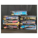 Seven Hot Wheels NASCAR diecast Team transporters