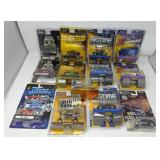 Group of 1:64 die-cast model cars