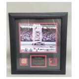 Framed Dale Earnhardt print with piece of race