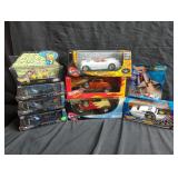 Group of Hot Wheels toy cars in original boxes