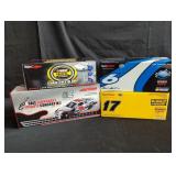 4 die-cast NASCAR model race cars