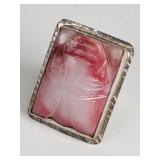 Sterling silver ring with carved stone face
