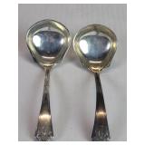 Pair of antique sterling silver serving spoons