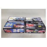 Four NASCAR 1 2:4 scale stock car die-cast models