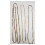 Three faux pearl necklaces