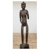 African carved wood female statue
