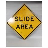 Vintage decommissioned "Slide Area" road sign