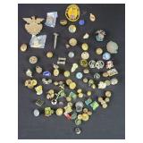Collection of assorted lapel pins, military