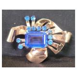Vintage sterling silver brooch with blue glass