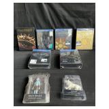 Group of Game of thrones DVDs and figurines